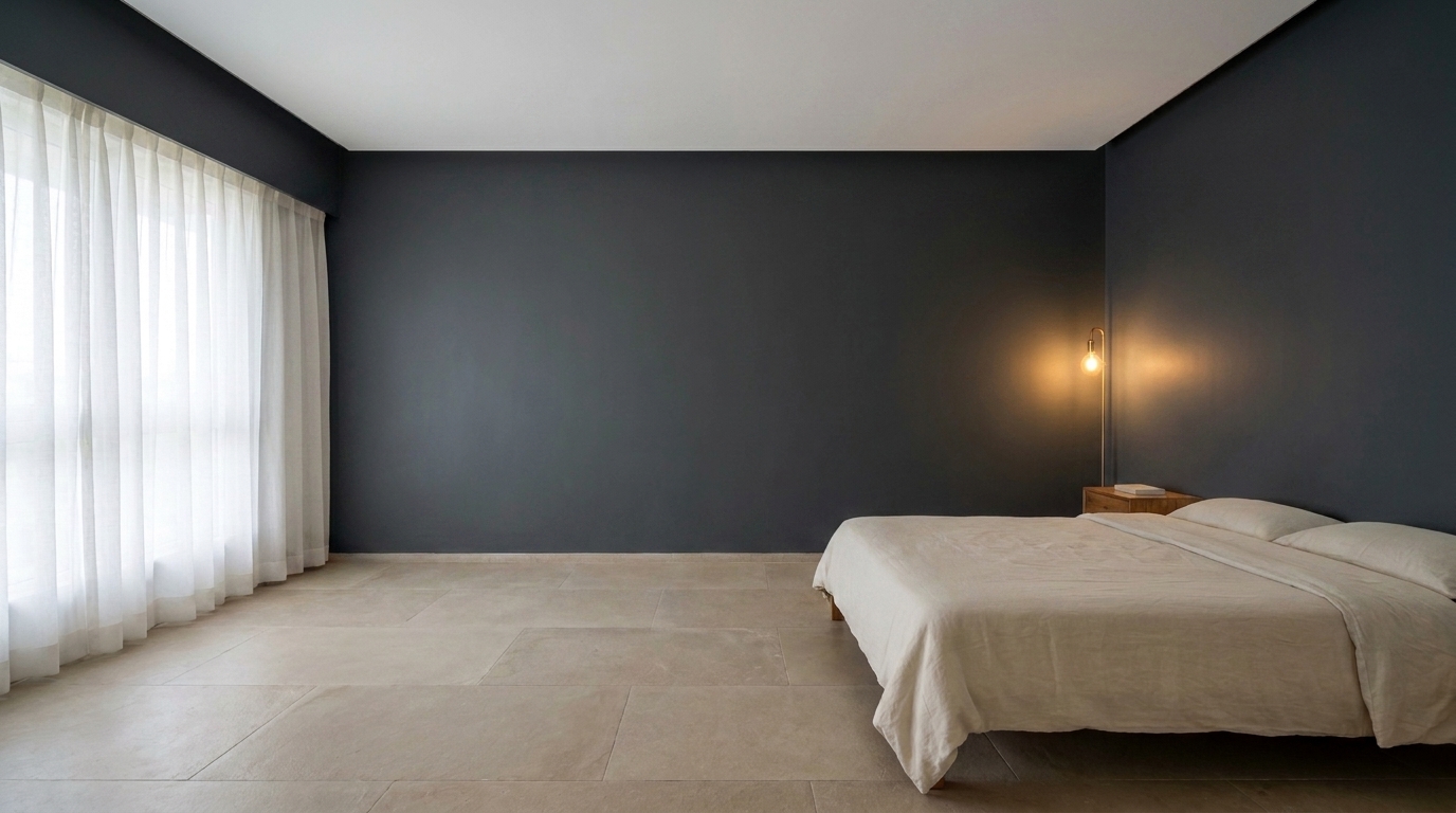Bedroom with dark walls and light ceiling creating an airier feeling.