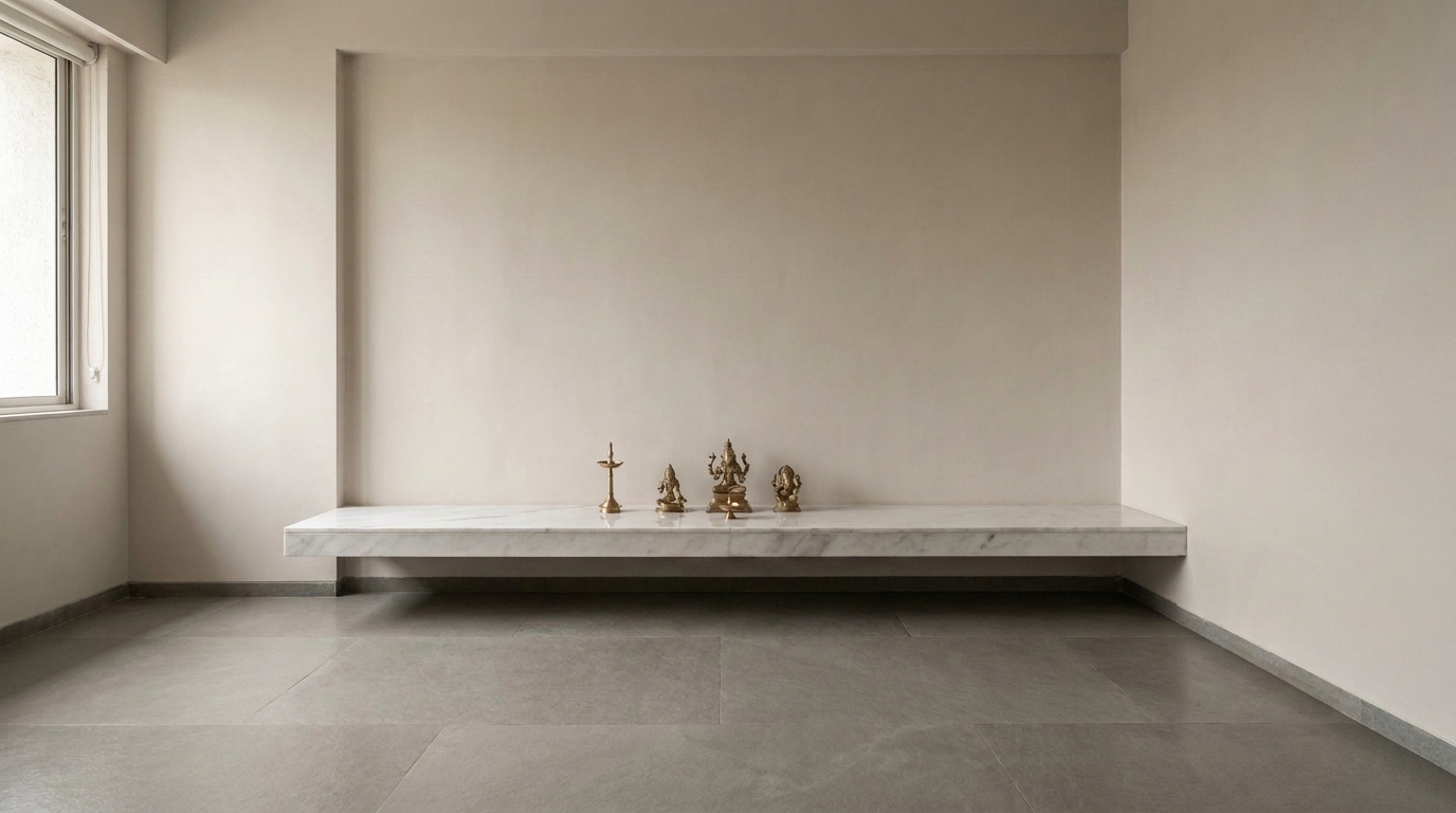 Pooja platform at comfortable height with floor cushion for seated prayer.