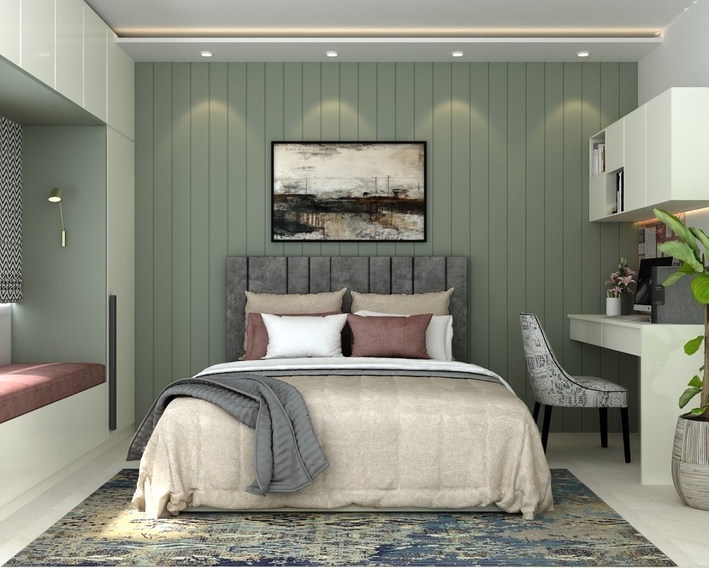 Render of a master bedroom with sage-green vertical wall panelling behind a channel-tufted grey upholstered bed, framed art above the headboard