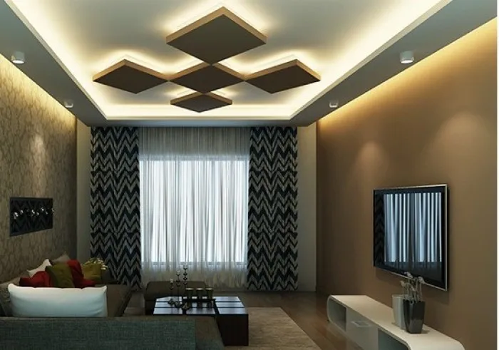 Render of a living room under a POP false ceiling of four floating diamond panels ringed with cove light