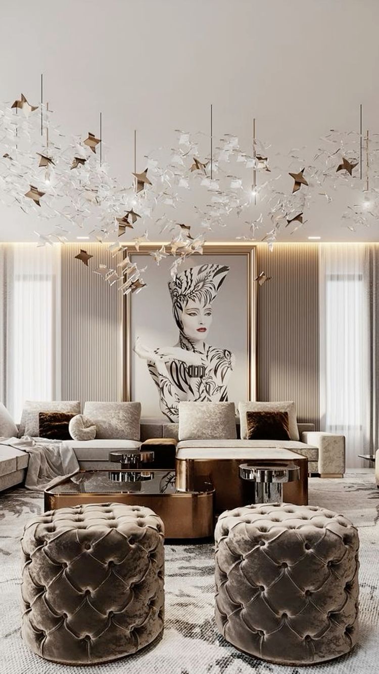Render of a maximalist living room with a sculptural crystal-and-bronze chandelier over tufted velvet ottomans and a bronze-framed coffee table beneath a large