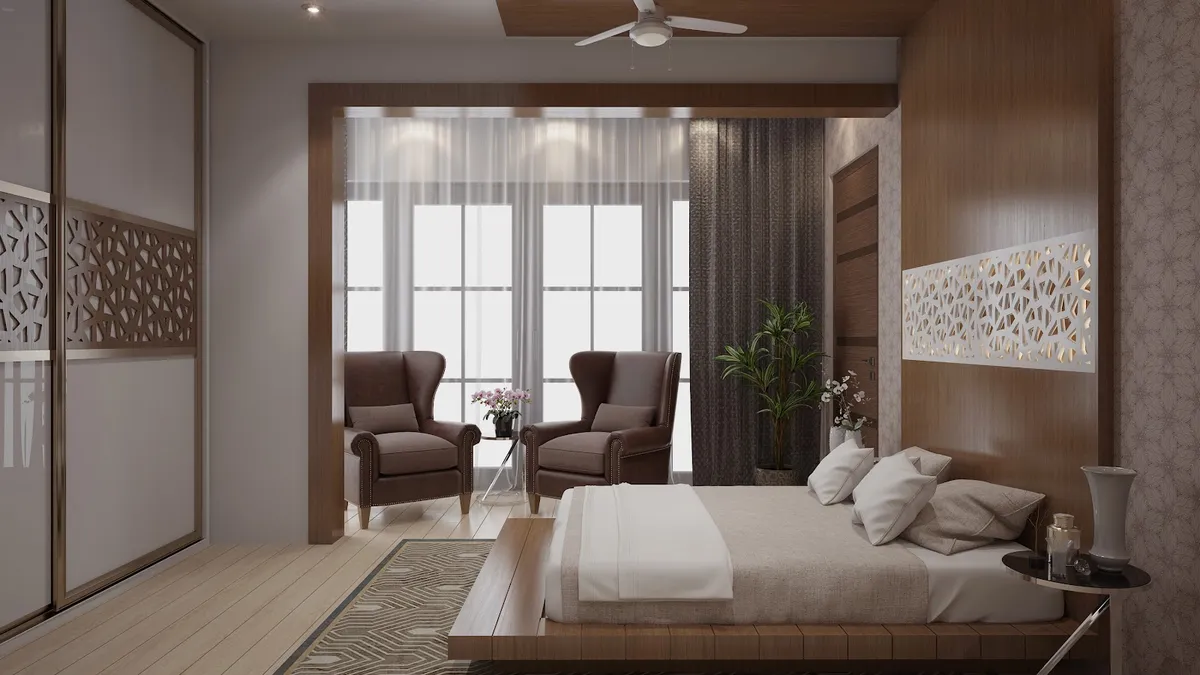 Render of a bedroom with a low teak platform bed under a horizontal backlit CNC jaali strip, two brown wingback chairs at the sheer-curtained window