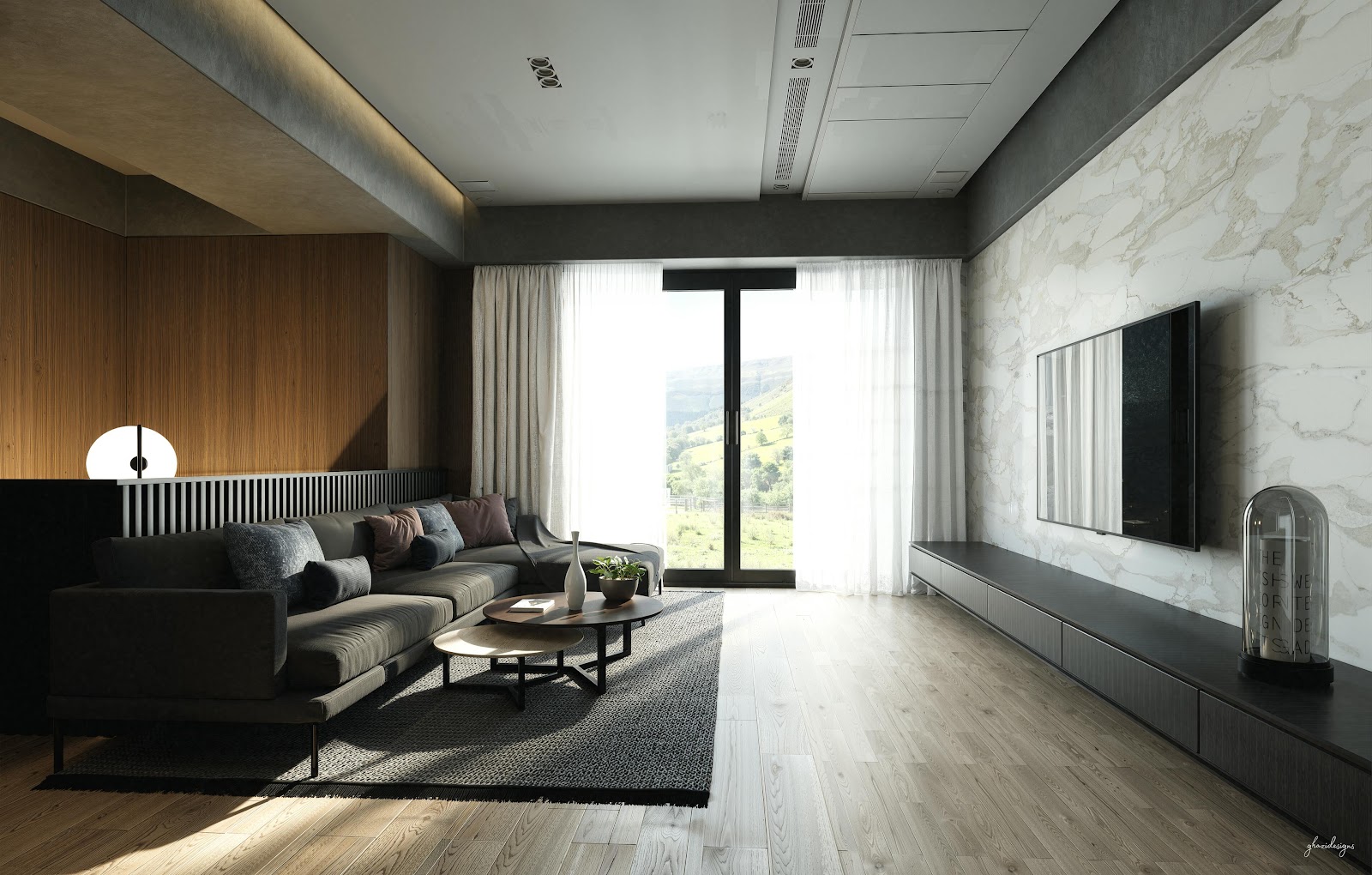 Render of a living room with a dark grey sectional sofa and nested round coffee tables facing a marble slab TV wall, glass doors opening onto a hillside view.