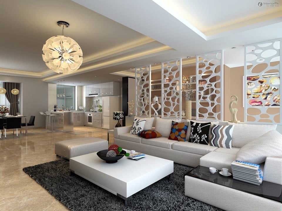 Render of an open living-dining space with a decorative white cellular partition screen dividing the sofa zone from the kitchen