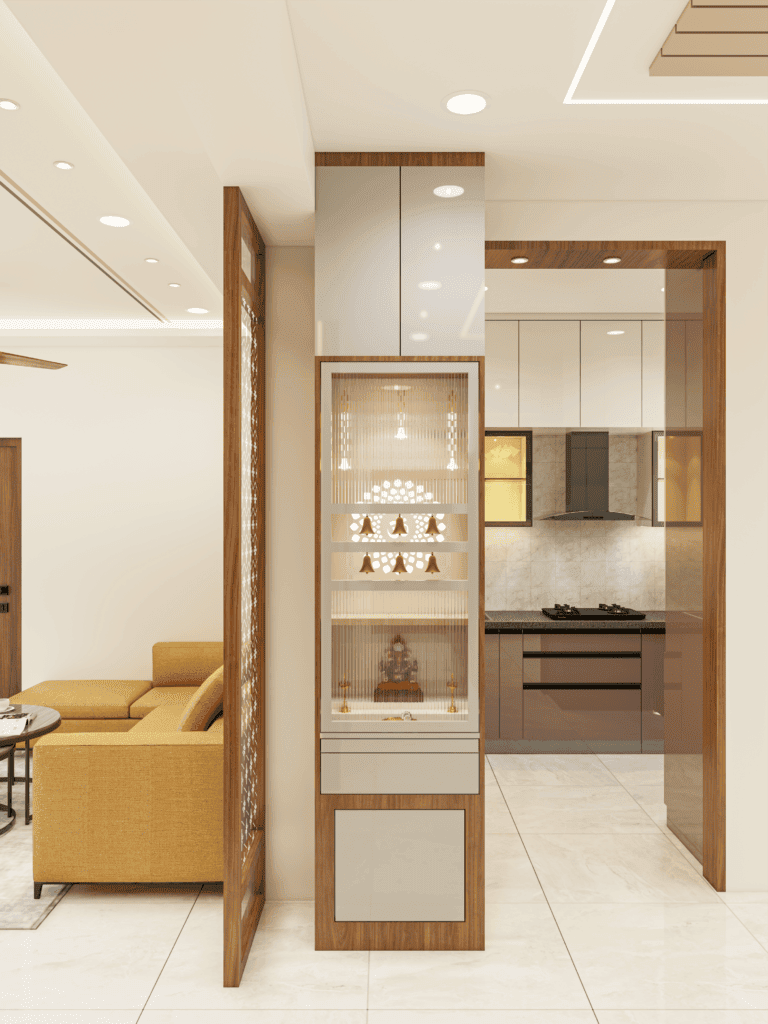 Render of a built-in pooja unit with fluted glass doors, brass bells and a deity idol, flanked by a jaali screen, opening to living and kitchen areas.