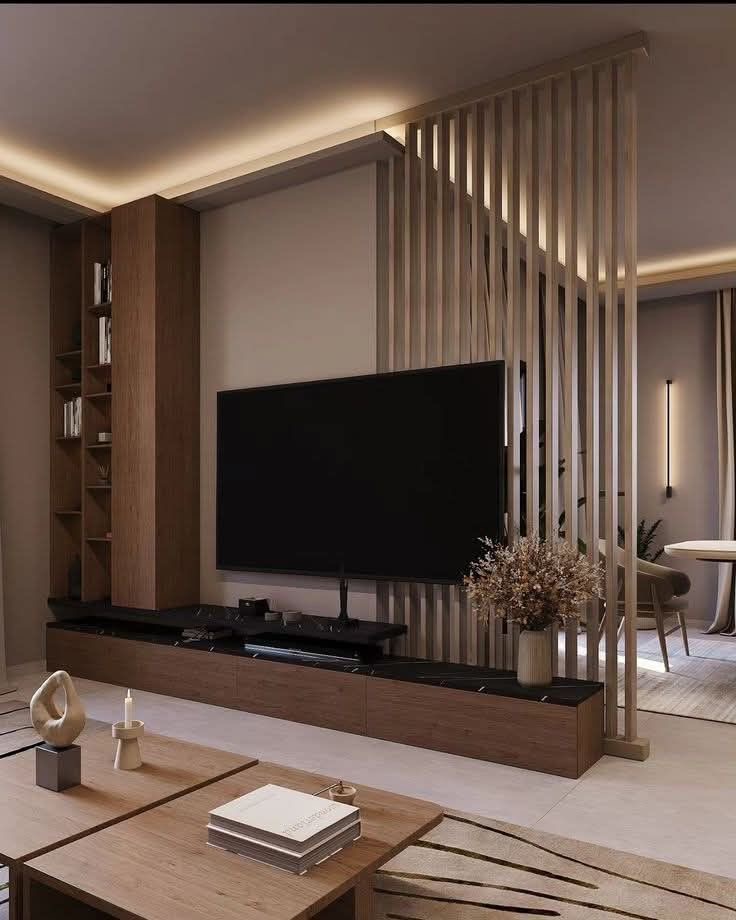 Render of a living-room TV wall with a floating dark-topped wood console and a fluted timber slat partition with cove lighting
