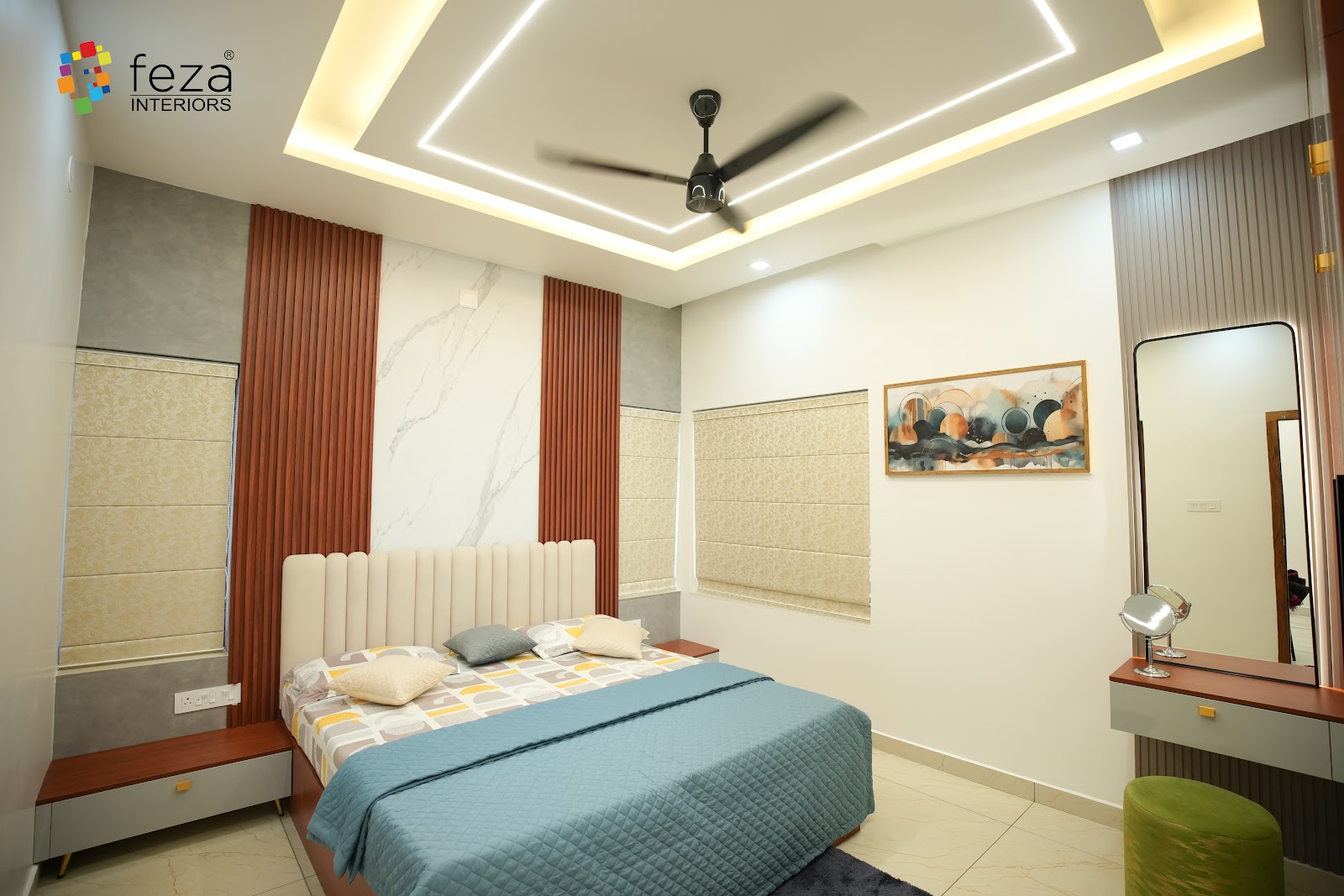 Bedroom with a channel-tufted cream upholstered headboard against a marble panel wall flanked by rust fluted wood panelling, a layered cove-lit false ceiling