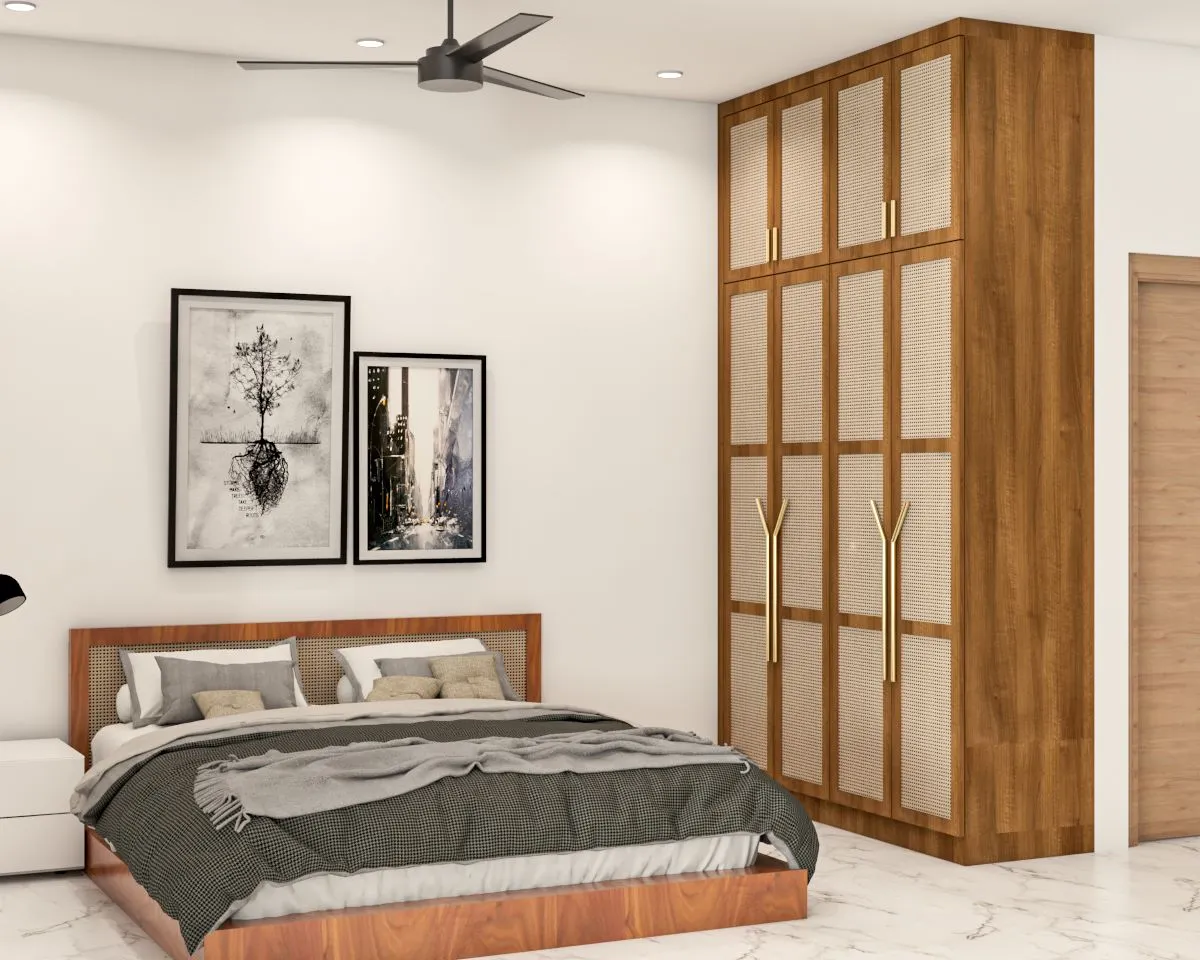 Render of a bedroom with a matching cane-and-wood bed and floor-to-ceiling wardrobe with brass Y-shaped handles