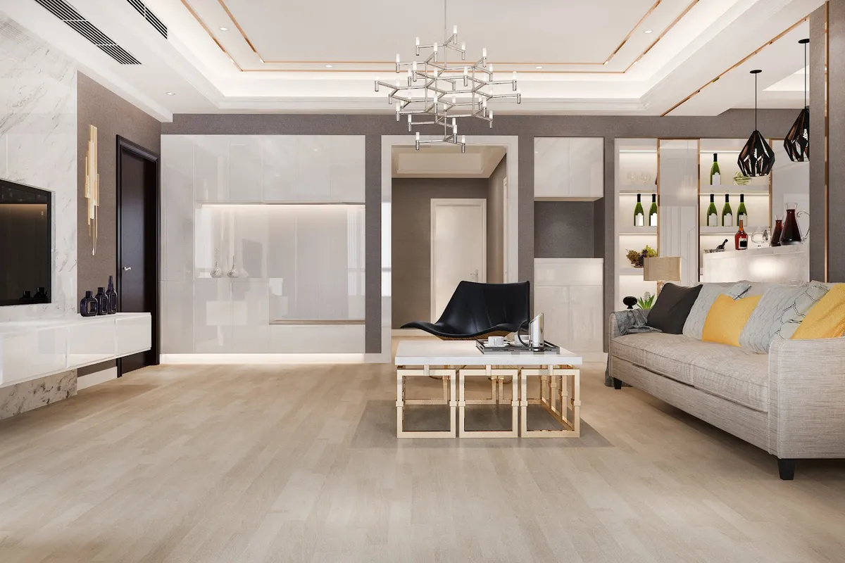 Render of a living room with a marble-clad TV wall, a black leather chaise lounge chair, a gold cube coffee table