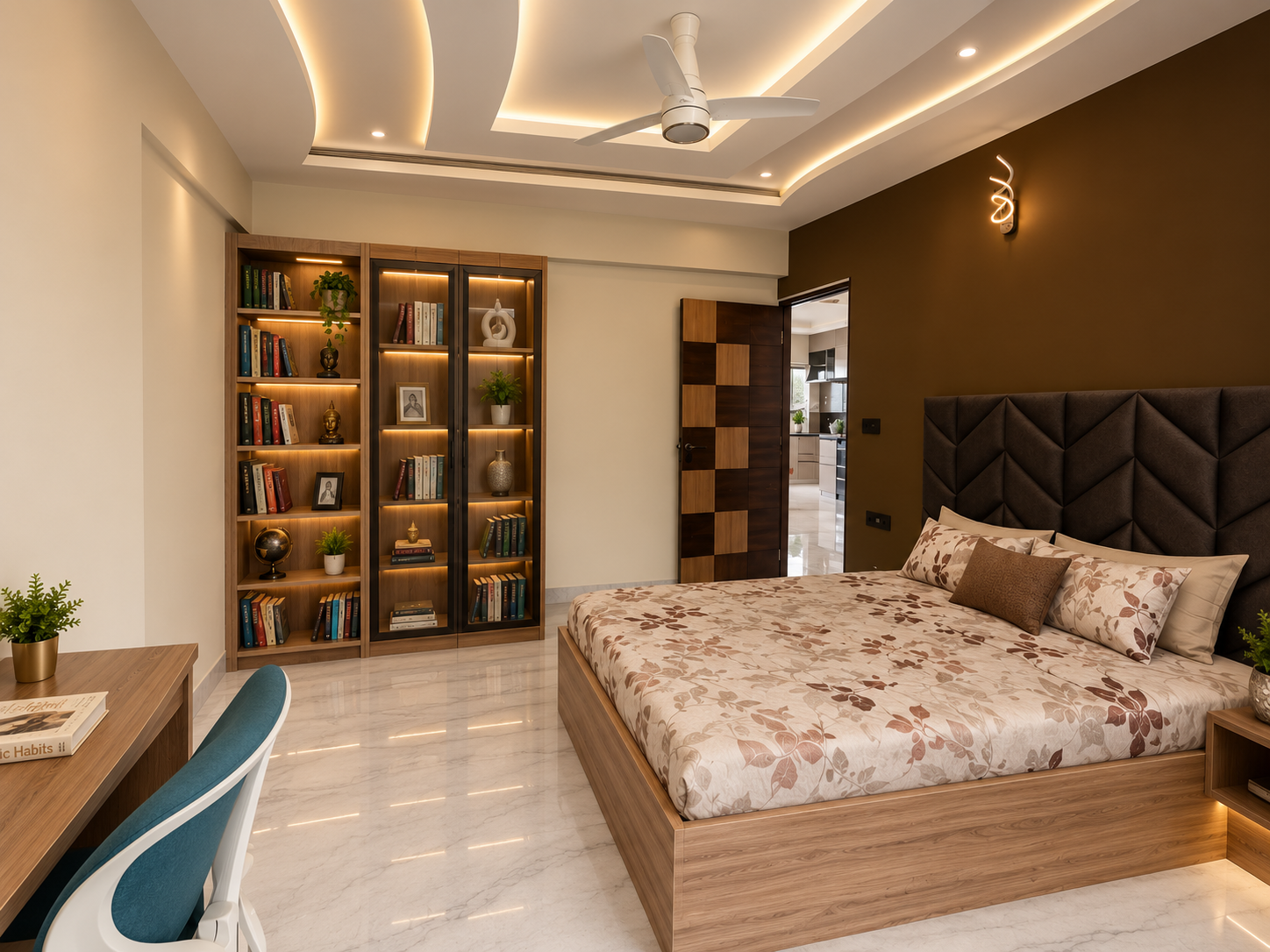A master bedroom with a dark chevron-quilted upholstered headboard against an espresso accent wall, a built-in lit bookshelf