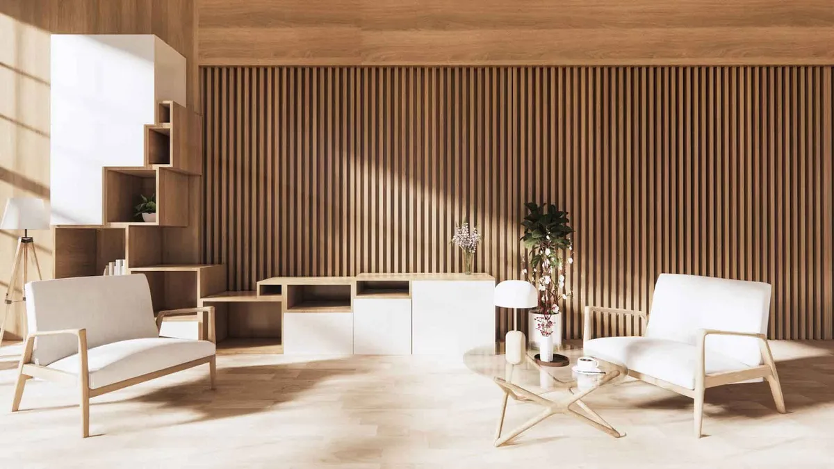 Render of a japandi living room: a full-height oak slat wall behind a white-and-oak low sideboard, a stepped cube shelf climbing the corner