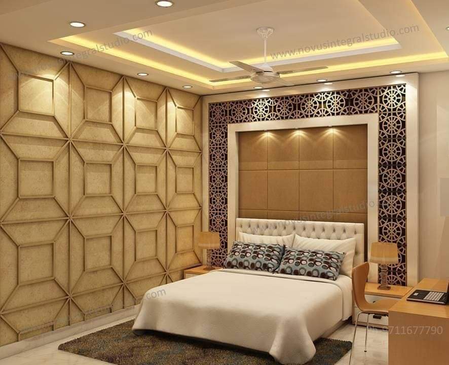 Render of a bedroom with a geometric diamond-panelled wall, an upholstered tufted headboard framed by an ornate laser-cut screen