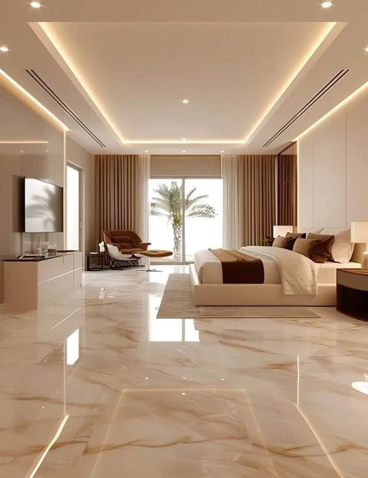 Render of an oversized master bedroom whose mirror-polished onyx-veined marble floor reflects a stepped cove-lit ceiling