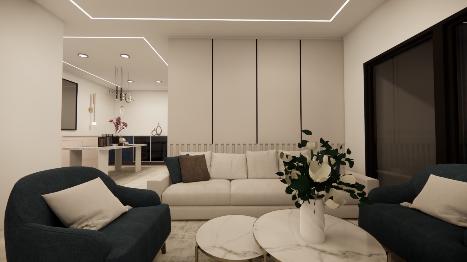 Render of a living room with a cream sofa and navy accent armchairs around round marble nesting coffee tables