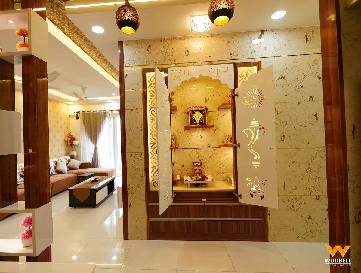 Backlit onyx-look pooja niche with CNC-cut Ganesha and diya jaali shutters under 'Shubh Labh' lettering
