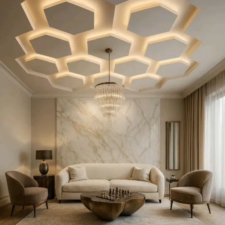 Render of a living room under a honeycomb ceiling of backlit hexagonal coffers, with a tiered crystal chandelier over a cream sofa