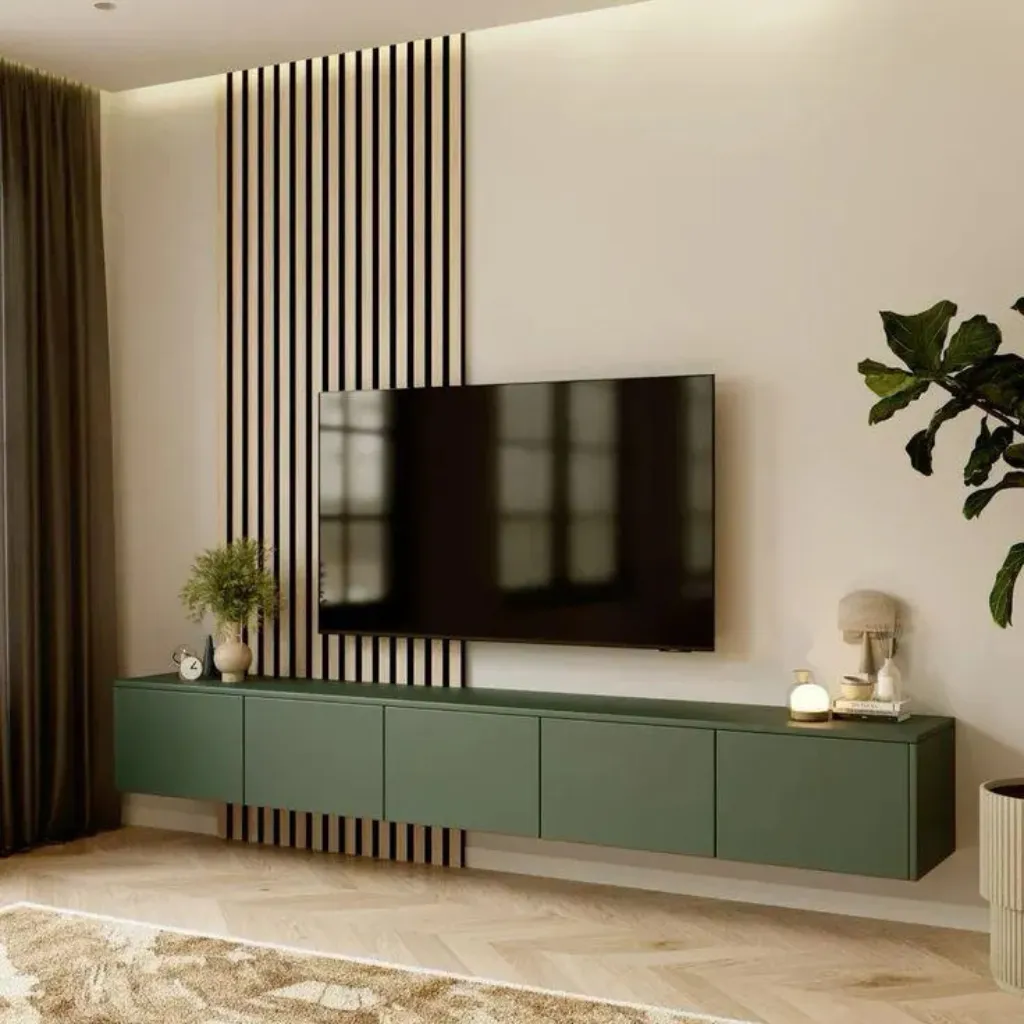Render of a living-room media wall: a long olive-green handleless floating console under a wall-mounted TV, black vertical slats on an oak backing behind it