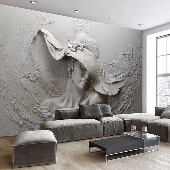 Render of a grey living room whose whole back wall is a sculpted relief of a woman in a wide-brimmed hat with butterflies around her