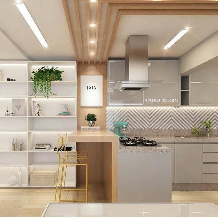 Render of an open kitchen with a grey chevron backsplash, speckled stone island carrying the hob under a steel island hood
