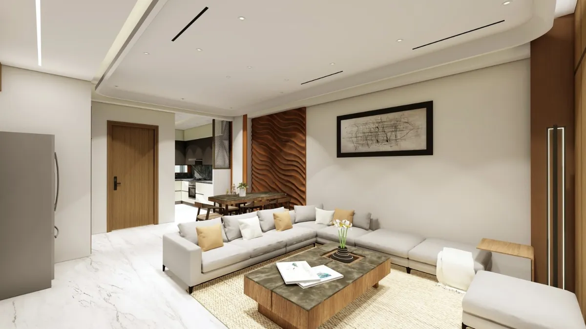 Render of an open-plan living room where a grey L-sofa with mustard cushions faces a low stone-top table on jute