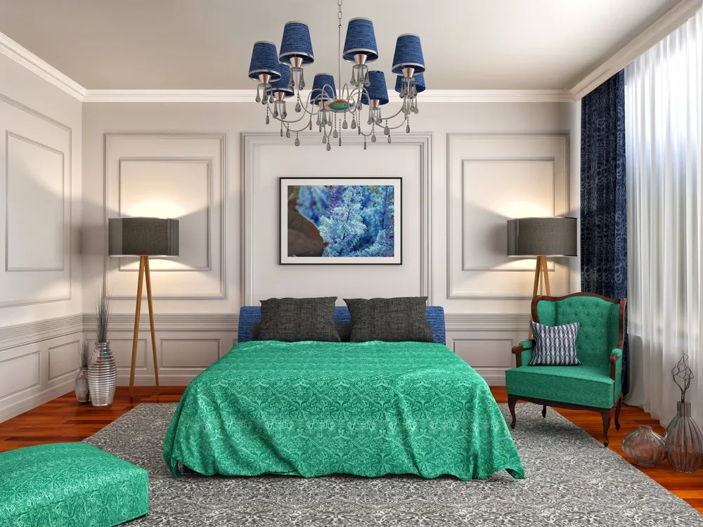 Render of a bedroom where an emerald damask bedspread and matching buttoned wing chair sit against off-white moulded wall panels