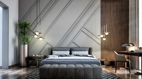 Render of a grey upholstered bed set against a headboard wall of diagonal criss-cross mouldings, with a brass three-drop pendant on one side