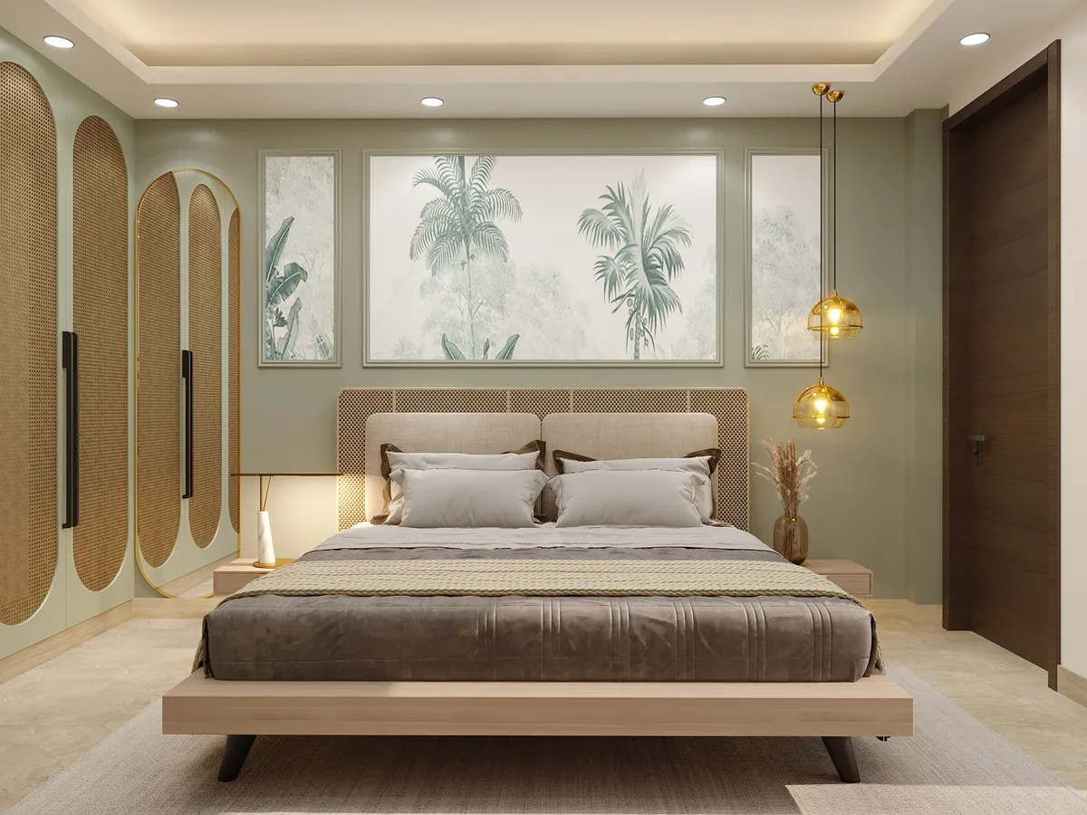 Render of a sage-green bedroom where arched cane-webbed wardrobe shutters with brass beading face a matching cane headboard wall