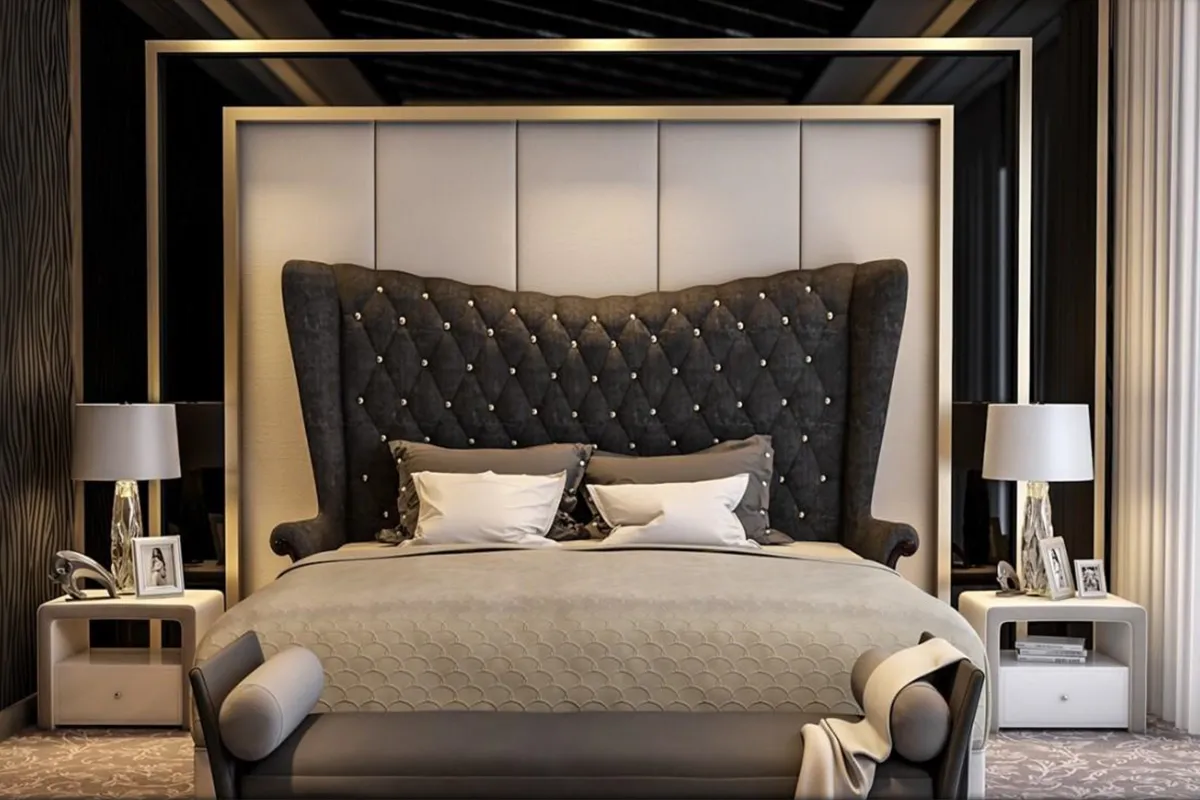 Render of a master bedroom with a tufted charcoal wingback headboard framed in a gold panel surround, flanked by matching nightstands.