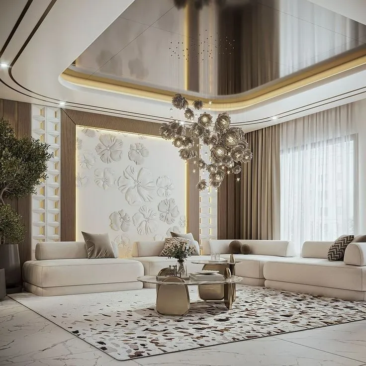 Render of a large living room where a sculpted white floral relief wall sits between backlit jaali columns