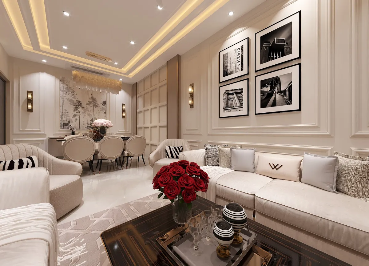Render of a cream neo-classical living room with a grid-panelled wall, four black-and-white city photographs above a long ivory sofa and red roses on an ebony
