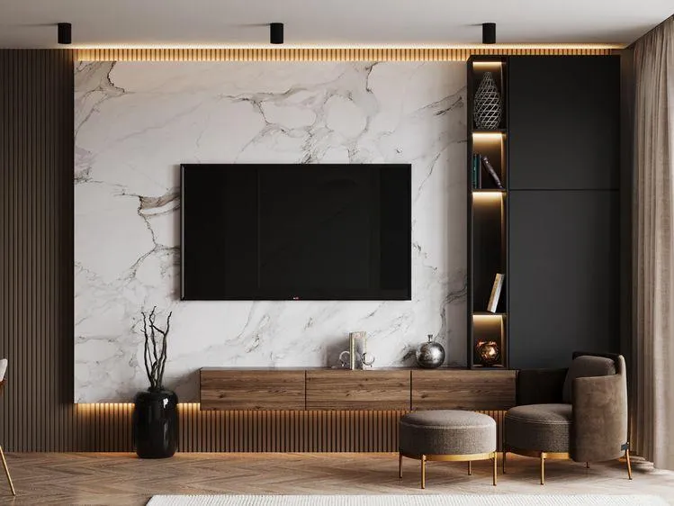 Render of a living-room TV wall in white veined marble, edged by greige fluted panelling with light washing down behind it