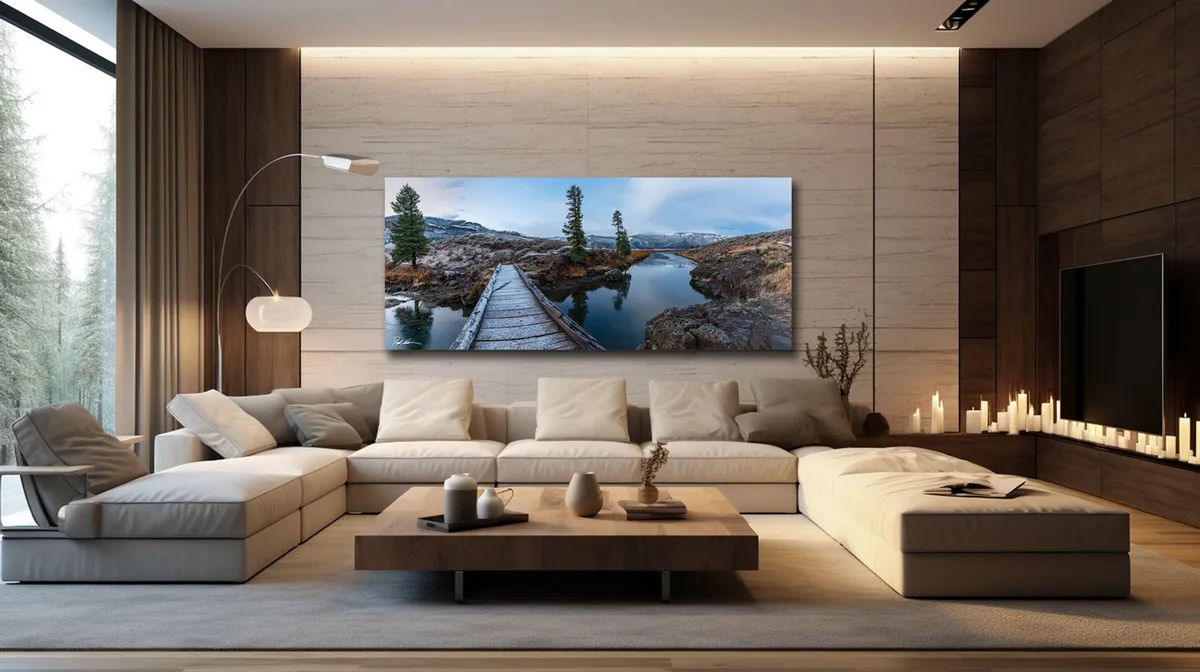 A render of a neutral-toned living room with a stone-clad feature wall, an oversized panoramic canvas print above a beige sectional sofa