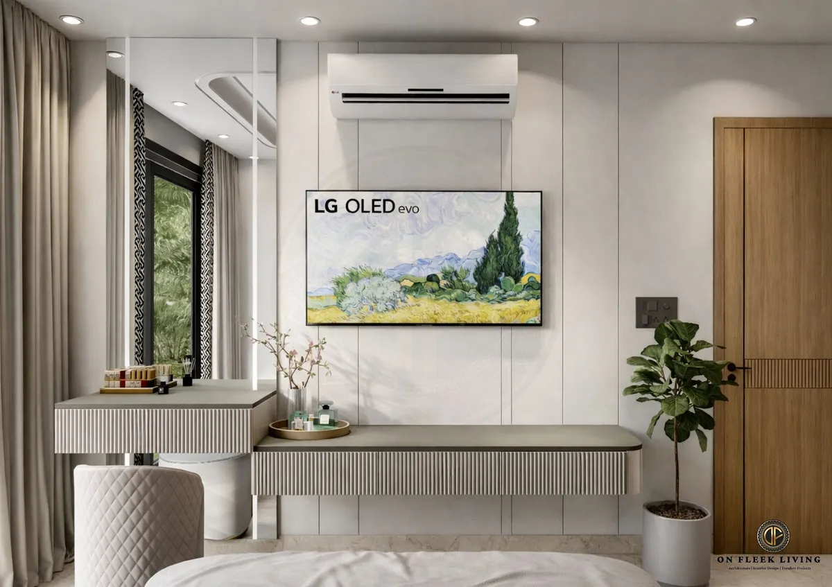 Render of a bedroom's dressing-and-TV wall: a full-width fluted floating console steps up into a dressing table with a quilted stool