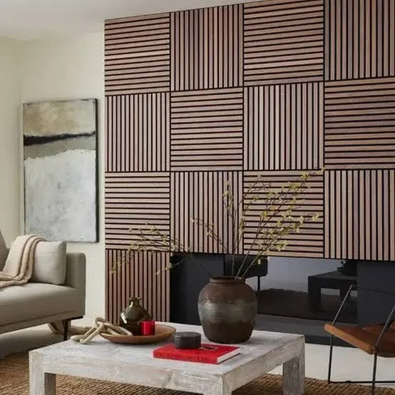 Walnut slats set in alternating horizontal and vertical squares make a checkerboard feature wall above a low black hearth unit