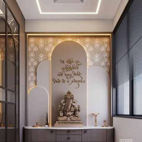 Pooja niche with a backlit arched alcove, a floral-motif wall pattern, a Ganesh idol, and a wood console with drawers for