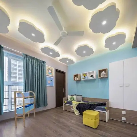 Kids' bedroom with a cloud-shaped cove-lit POP ceiling, a sky-blue accent wall, teal curtains and a storage bed with a