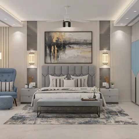 Master bedroom with a geometric channel-tufted grey headboard, a blue wingback chair, a bench at the foot of the bed, and a