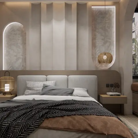 Bedroom with a fluted fabric-panel headboard wall and arched botanical-wallpaper niches, a rattan pendant and cage table