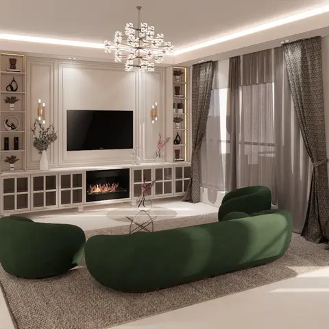 Living room with a curvy emerald-green velvet sofa facing a panelled TV wall with a built-in fireplace, beneath a