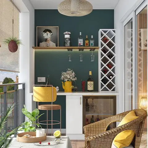 Compact balcony converted into a mini bar corner with a dark teal accent wall, built-in wine rack, hanging planters and a