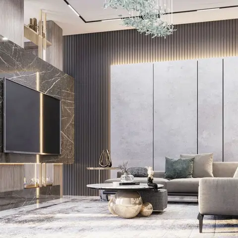 Living room with a book-matched marble slab TV wall housing a linear fireplace, fluted dark panelling, a leaf-branch