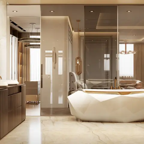 Luxury bathroom with a faceted diamond-cut freestanding tub in gold and white, a dark wood double vanity with vessel basins,