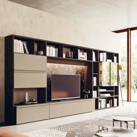 Living room with a dark walnut and beige TV wall unit featuring open bookshelves and a backlit textured stone panel behind