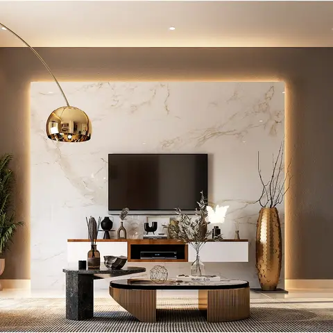 Living room with a backlit marble TV feature wall, gold arc floor lamp, teal velvet armchairs and a pair of round