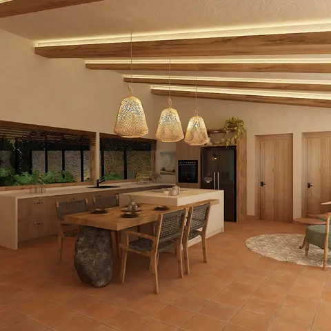 Boho kitchen-dining space with rattan bell pendant lights over a stone-base wood dining table, terracotta tile flooring, and