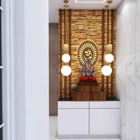 A pooja nook with a stacked stone feature wall centred on a carved wood Om medallion above a Ganesha idol, flanked by globe