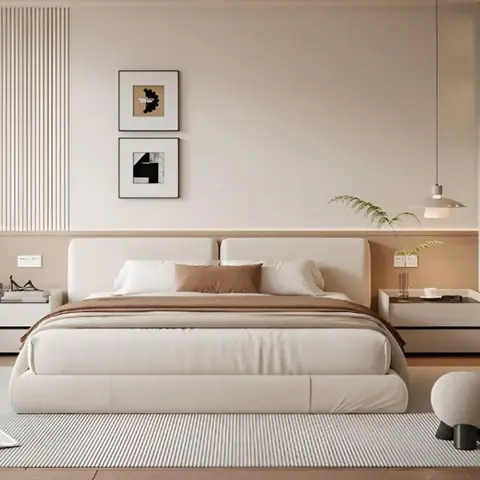 Bedroom with an upholstered king bed flanked by floating nightstands and pendant lamps, a fluted wood-slat accent wall with
