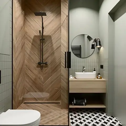 Bathroom with a glass-enclosed shower lined in chevron wood-look tile, a floating wood vanity with a vessel sink, a round
